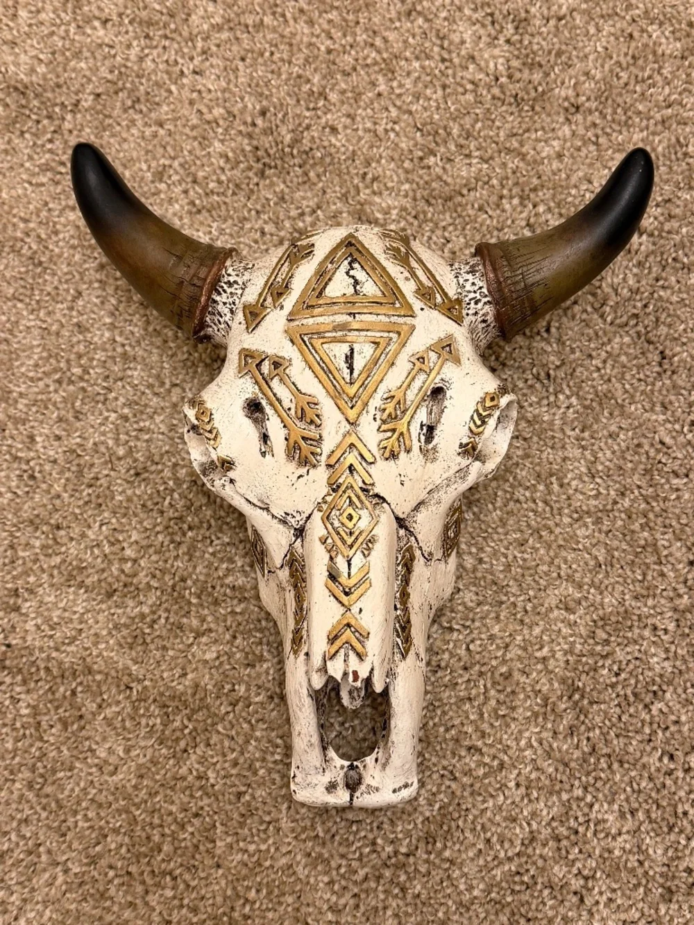 Resin cattle skull with gold design